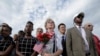 People watch as U.S. President Barack Obama, Defense Secretary Ash Carter and Joint Chiefs Chair Gen. Joseph Dunford take part in a ceremony marking the 15th anniversary of the 9/11 attacks at the Pentagon in Washington, Sept. 11, 2016. 