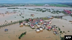 The aerial photo taken on July 2, 2024 shows submerged buildings after a flood peak in Jiujiang, in central China's Jiangxi province. 
