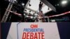 Ben Starett, lighting programmer for CNN, sets up lights in the spin room for the presidential debate between President Joe Biden and former President Donald Trump in Atlanta, June 26, 2024.