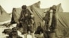 FILE - British mountaineers George Mallory is seen with Andrew Irvine at the base camp in Nepal, both members of the Mount Everest expeditions 1922 and 1924, as they get ready to climb the peak of Mount Everest, June 1924. 