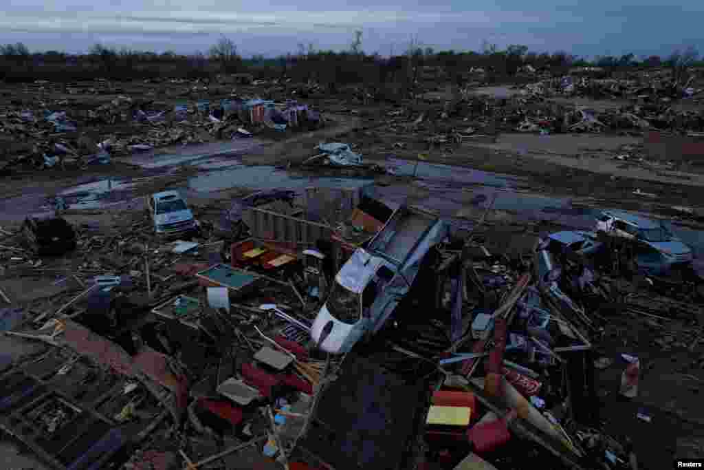 A pickup truck sits on top of the wreckage of Chuck&#39;s Dairy Cafe after thunderstorms spawning high straight-line winds and tornadoes ripped across the state in Rolling Fork, Mississippi, U.S.
