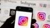 FILE - The Instagram logo is seen on a cellphone in Boston, Oct. 14, 2022. Turkish official accused Instagram of blocking condolence posts following the assassination of Ismail Haniyeh, leader of the Palestinian militant group Hamas.