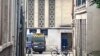 A police car is parked in front of the synagogue in Rouen, France, May 17, 2024. 