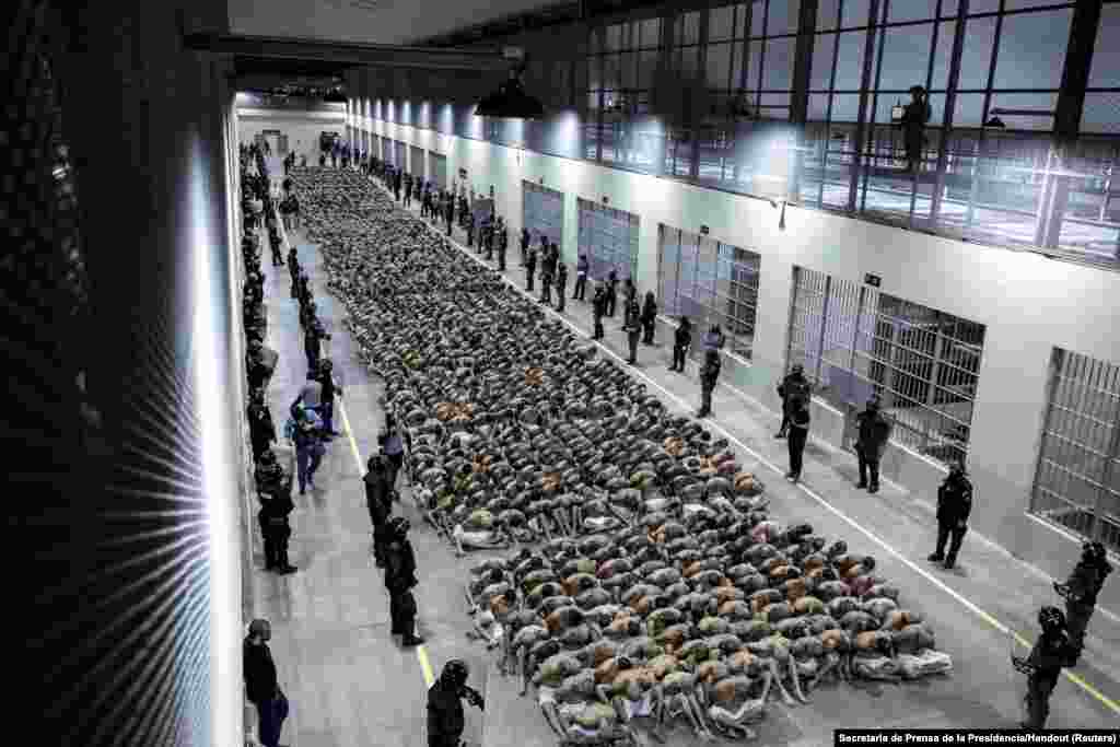 Two thousand gang members wait to be taken to their cells after they were transferred to the Terrorism Confinement Center, according to El Salvador&#39;s President Nayib Bukele, in Tecoluca, March 15, 2023. &nbsp; &nbsp; 