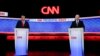 FILE - President Joe Biden, right, and Republican presidential candidate former President Donald Trump, left, stand during break in a presidential debate hosted by CNN in Atlanta, Georgia, June 27, 2024.