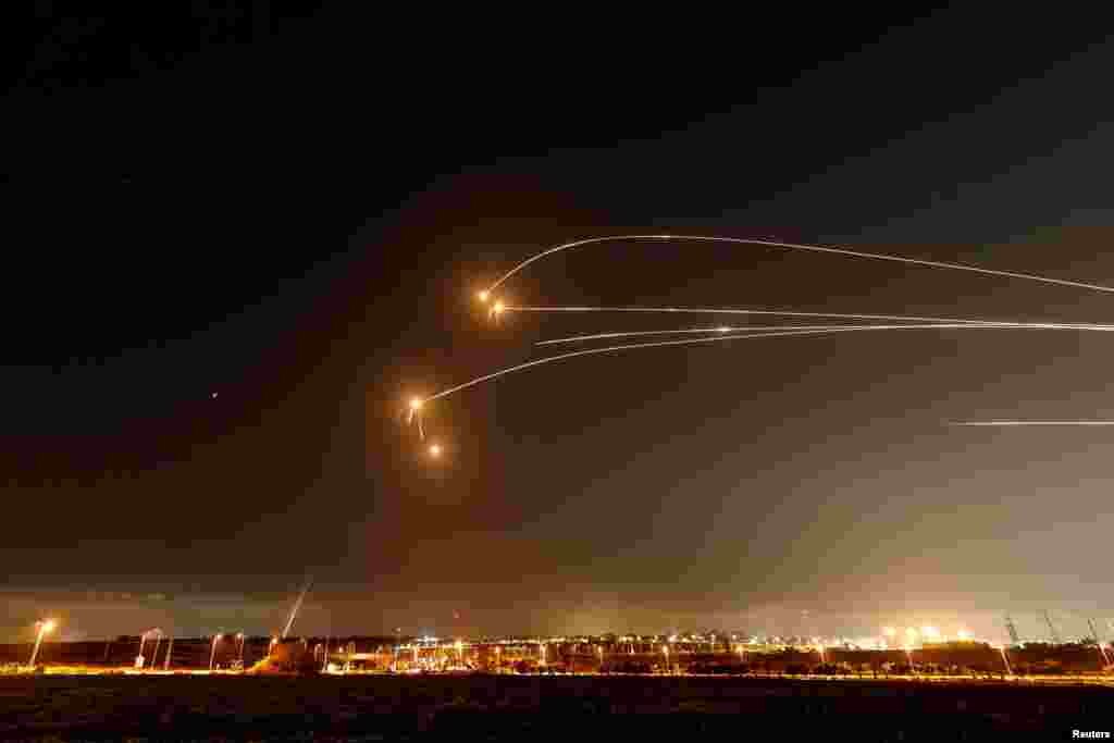 Israel's Iron Dome anti-missile system intercepts rockets launched from the Gaza Strip, as seen from Sderot, Israel, May 13, 2023 