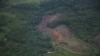 FILE - A deforested area that, according to authorities, is used for coca leaf plantations is seen during an overflight by the Colombian anti-narcotics police in Putumayo, Colombia, Nov. 12, 2023.
