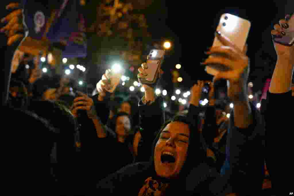 Women shout slogans as they gather to mark International Women&#39;s Day in Istanbul, Turkey.