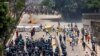 Anti-quota supporters clash with police and Awami League supporters at the Rampura area in Dhaka, Bangladesh, July 18, 2024. 