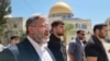 Israeli National Security Minister Itamar Ben-Gvir, left, visits Al-Aqsa compound also known to Jews as the Temple Mount, in Jerusalem's Old City on Aug. 13, 2024, in this video still obtained from a handout video. (Temple Mount Administration/Handout via Reuters)