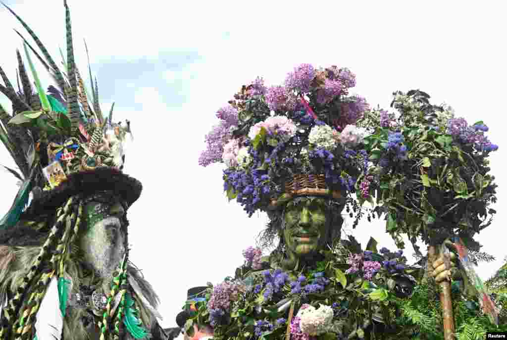 Participants attend the annual May Day bank holiday &quot;Jack In The Green&quot; parade and festival in Hastings, Britain.