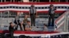 Law enforcement officers gather at the campaign rally site for Republican presidential candidate former President Donald Trump, July 13, 2024, in Butler, Pennsylvania.