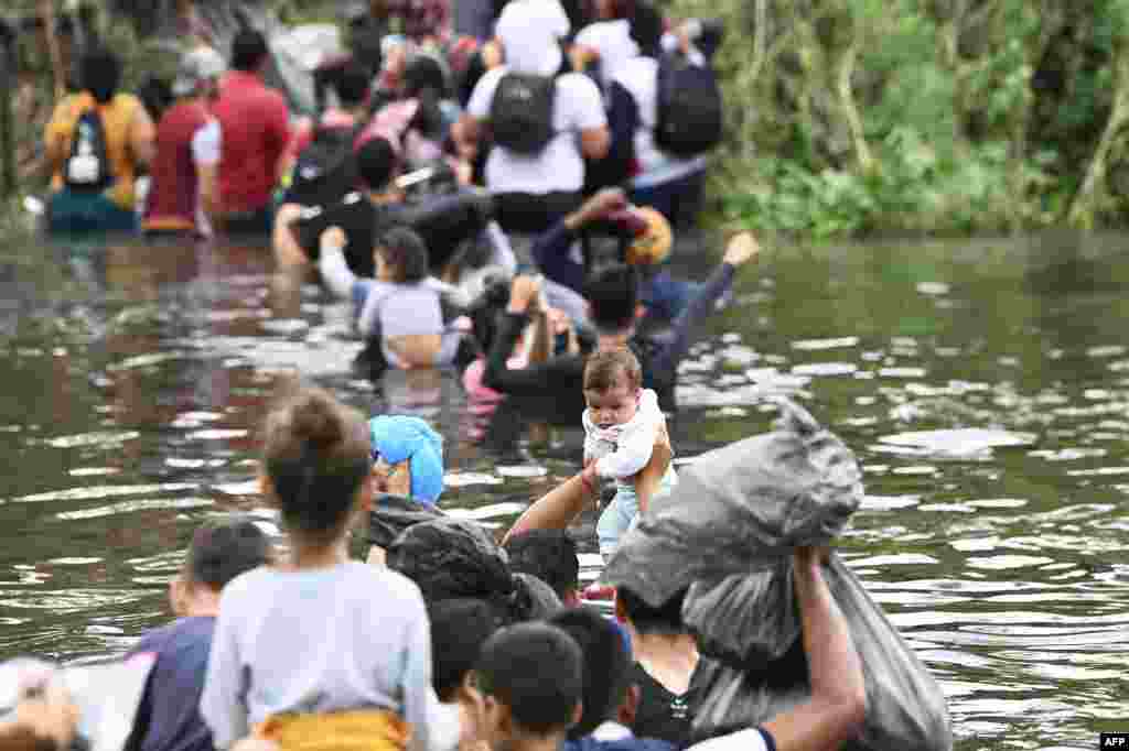 Migrants try to get to the U.S. through the Rio Grande as seen from Matamoros, state of Tamaulipas, Mexico. A surge of migrants is expected at the U.S.-Mexico border as the Biden administration officially ends its use of Title 42. 
