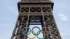 Olympic rings are pictured on the Eiffel tower ahead of Paris 2024, July 18, 2024.
