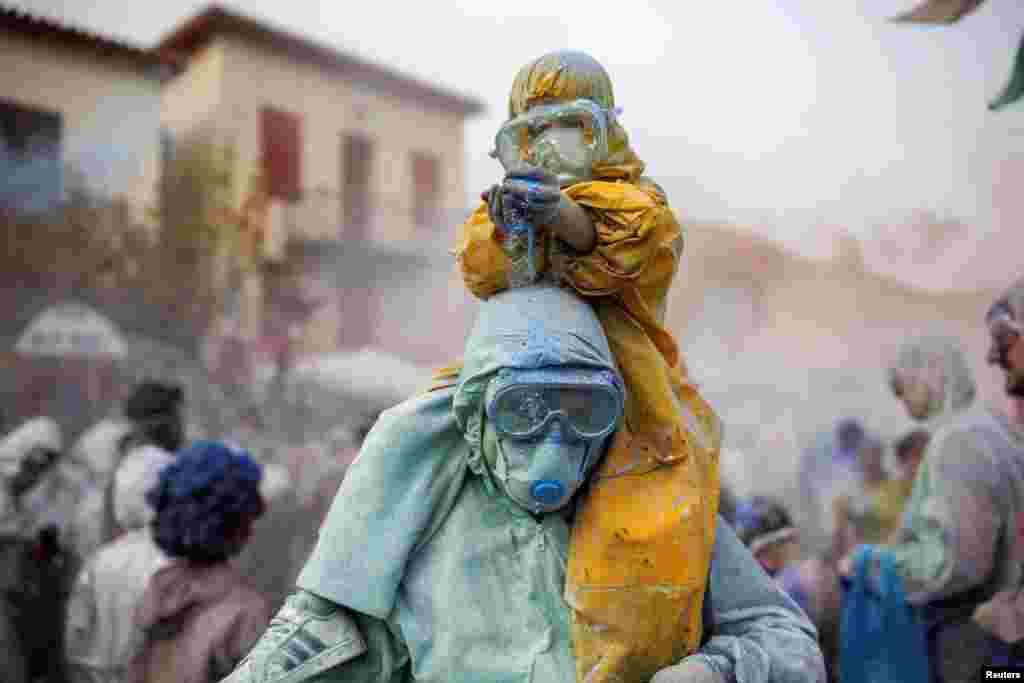 Revelers celebrate &quot;Ash Monday,&quot; a traditional festivity marking the end of the carnival season and the start of the 40-day Lent period until the Orthodox Easter, in the port town of Galaxidi, Greece.&nbsp;