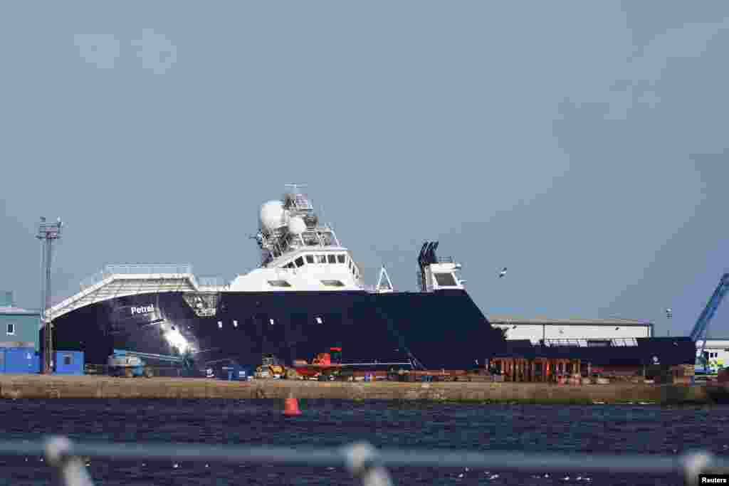 The research vessel&nbsp;Petrel&nbsp;is seen tipped on its side in a dry dock in Leith, Scotland.
