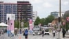 People travel near the Team USA residence building at the 2024 Paris Olympics athlete village in Saint-Denis, France, July 23, 2024. (Kirby Lee/USA Today Sports)