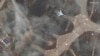 This image released by Maxar Technologies shows an overview of a destroyed SU 27 fighter aircraft at Belbek air base, near Sevastopol, in Crimea, May 16, 2024.