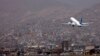 FILE - An Ariana Afghan Airlines aircraft takes off from the airport in Kabul, Sept. 11, 2021.