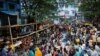 Doctors, paramedics and medical students gather as they attend a protest against what they say was rape and murder of a trainee doctor, inside the premises of R G Kar Medical College and Hospital in Kolkata, India, Aug. 13, 2024. 