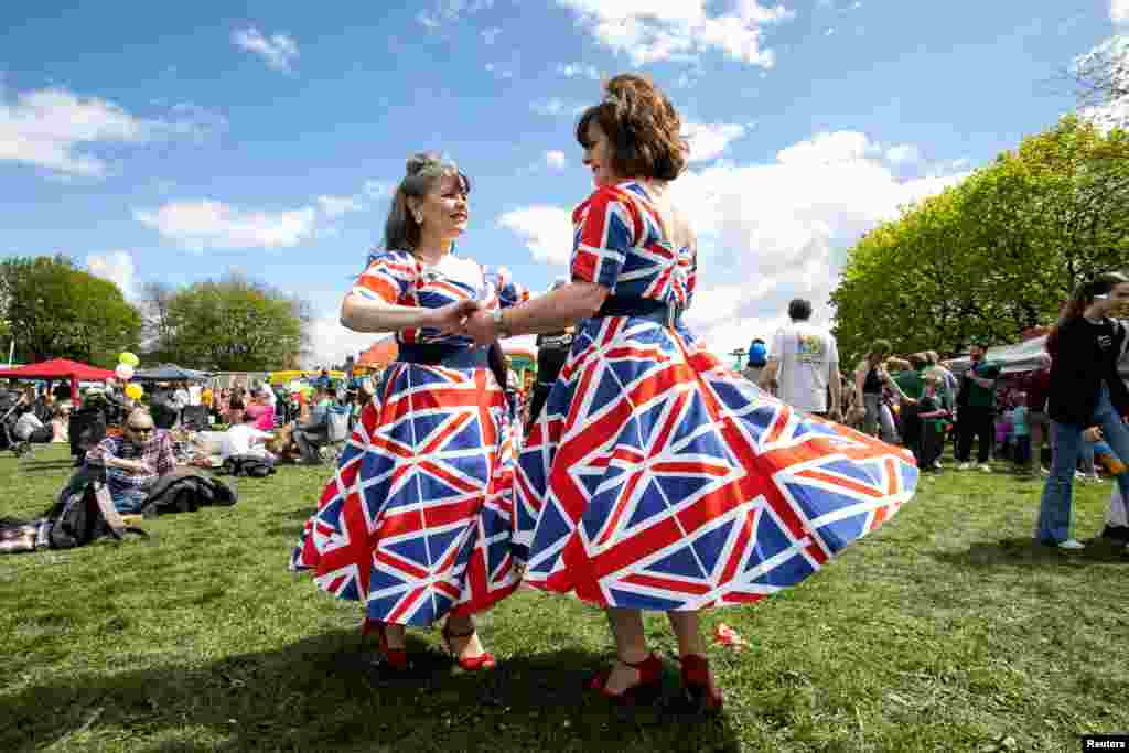 Laura Bridgewater and Joan Hoctor from the band &quot;Gentlemen Prefer Blondes&quot; entertain the crowds at the 10th Calon Hearts, Cardiff Carnival, Wales, Britain, May 1, 2023.