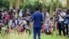 FILE - National Unity Party leader Bobi Wine addresses the media at his home in Magere, Uganda, Jan. 15, 2021. The opposition party's headquarters in the capital Kampala were sealed off on Monday ahead of planned anti-government protests. 