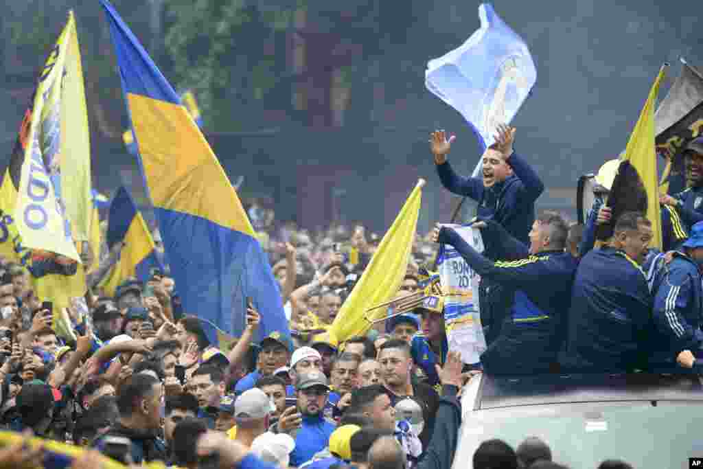 Boca Juniors's vice president Roman Riquelme waves to fans near La Bombonera stadium, demanding elections to appoint new club leadership, in Buenos Aires, Argentina, Dec. 3, 2023. 