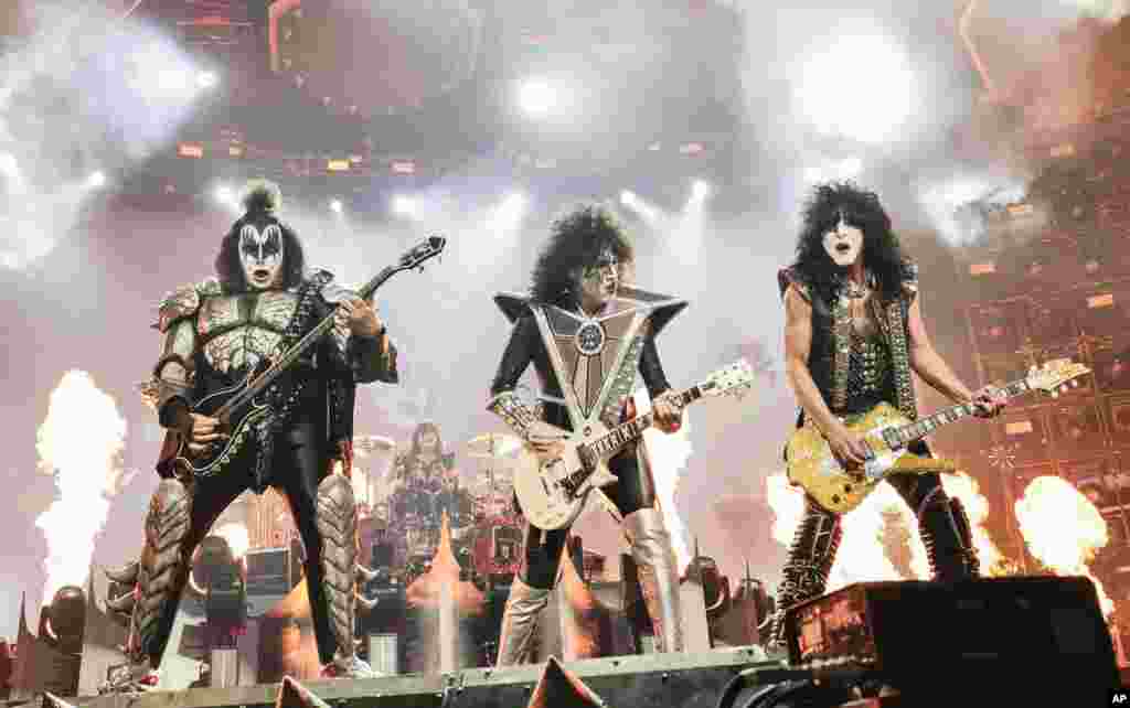 Gene Simmons, left, Tommy Thayer and Paul Stanley of KISS perform during the final night of the &quot;Kiss Farewell Tour,&quot; Dec. 2, 2023, at Madison Square Garden in New York. (Photo by Evan Agostini/Invision)