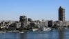 FILE - This picture taken on March 20, 2024 shows a view of residential buildings marking the skyline of the Nile river island of Manial al-Roda in Cairo.