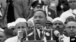 FILE - Martin Luther King Jr. addresses marchers during his 'I Have a Dream' speech at the Lincoln Memorial on Aug. 28, 1963, in Washington. 