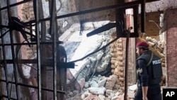 Security members arrive after suicide bombing in the police compound, in the Bara Khyber Pakhtunkhwa, of Pakistan, July 20, 2023.