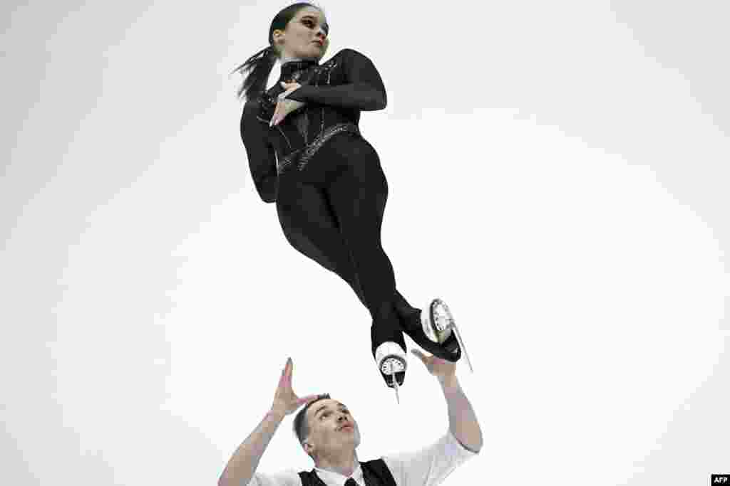Hungary&#39;s Maria Pavlova and Alexei Sviatchenko compete in the pairs short program during the ISU Grand Prix of Figure Skating Final in Beijing, China.