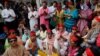 Supporters of Bangladesh Nationalist Party (BNP) chant slogans as they join in a rally, days after the resignation of former Prime Minister Sheikh Hasina, in Dhaka, Aug. 7, 2024.