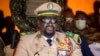 FILE - Guinean junta leader Colonel Mamady Doumbouya watches a military parade in Bamako, Mali, on Sept. 22, 2022. The draft of a new constitution released on July 29, 2024, would allow Doumbouya to participate in Guinea's next presidential election.