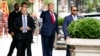 Former President Donald Trump gestures as he departs Trump Tower, Wednesday, Aug. 10, 2022, in New York, on his way to the New York attorney general's office for a deposition in a civil investigation.
