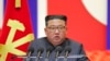 FILE - In this photo provided by the North Korean government, North Korean leader Kim Jong Un speaks during a 'maximum emergency anti-epidemic campaign meeting' in Pyongyang, North Korea, Aug. 10, 2022.