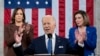 President Joe Biden delivers his State of the Union address to a joint session of Congress at the Capitol, March 1, 2022, in Washington, as Speaker of the House Nancy Pelosi and Vice President Kamala Harris look on.