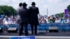 FILE - People attend the "NO FEAR: Rally in Solidarity with the Jewish People" event in Washington, July 11, 2021.