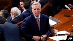Republican Congressman Kevin McCarthy stands after he failed to secure enough votes to become the new House Speaker during the opening day of the 118th Congress at the U.S. Capitol, in Washington, Jan. 3, 2023.