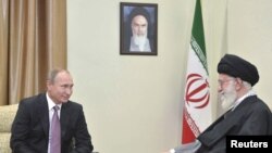 FILE - Russia's President Vladimir Putin, left, meets with Iran's Supreme Leader Ayatollah Ali Khamenei in Tehran, Iran, Nov. 23, 2015. 
