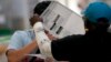 Election workers process ballots at the Clark County Election Department, in Las Vegas, Nevada, Nov. 10, 2022.