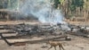 FILE - This photo from the humanitarian group Free Burma Rangers taken May 3, 2022, shows the remains of a building after attacks by the Myanmar military, according to the Free Burma Rangers, on a village in Doo Tha Htoo district in Myanmar's eastern Kayin state.