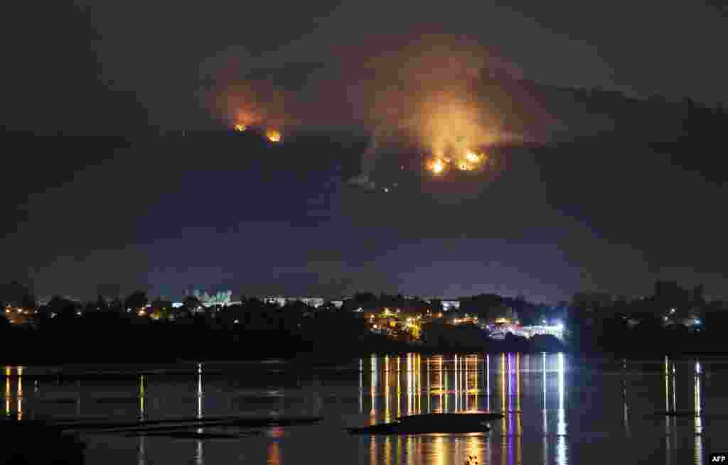 A forest fire approaches the town of Chiguayante, in the province of Concepcion, Chile.&nbsp;More than 5,600 local firefighters, with backup from Mexico, Colombia and Spain, were actively battling 89 priority fires out of a total of 311 burning a week into the disaster, officials said.