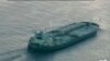 A still image from video taken by a U.S. Coast Guard HC-144 Ocean Sentry aircraft shows the oil tanker Union Kalavryta, which is carrying a cargo of Kurdish crude oil, approaching Galveston, Texas, July 25, 2014.