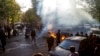FILE - In this photo taken by an individual not employed by the Associated Press and obtained by the AP outside Iran, Iranians protests the death of 22-year-old Mahsa Amini, Tehran, Oct. 27, 2022. 