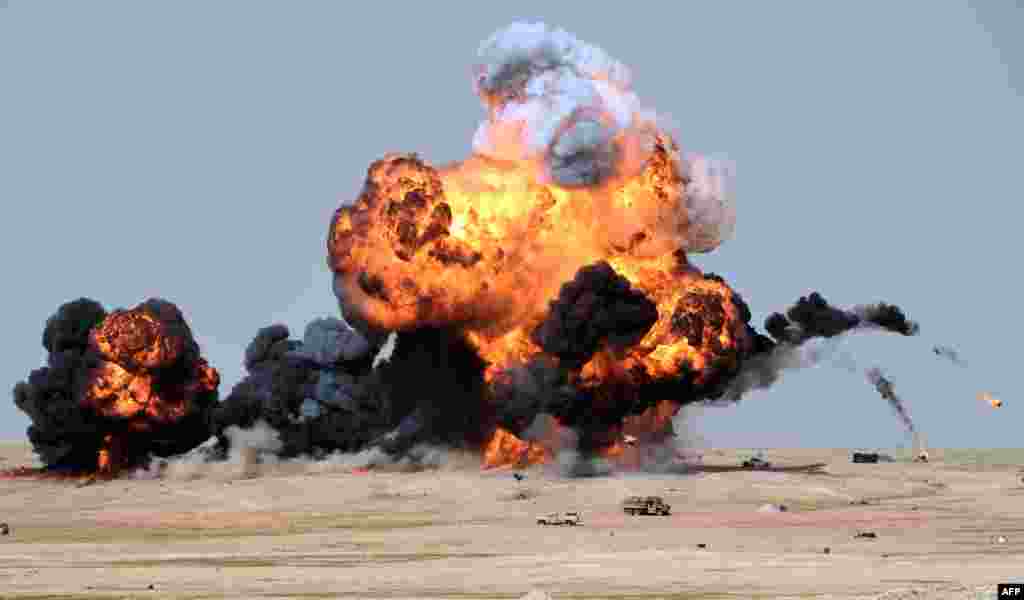 Smoke and fire billows following an aerial bombardment during the Northern Thunder military exercises in Hafr al-Batin, 500 kilometers north-east of the Saudi Capital Riyadh.