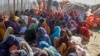 Somalis who fled drought-stricken areas sit at a makeshift camp on the outskirts of the capital Mogadishu, Somalia on Feb. 4, 2022.