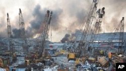 FILE - Aftermath of a massive explosion is seen in in Beirut, Lebanon, Aug. 4, 2020.