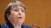 FILE - United Nations High Commissioner for Human Rights Michelle Bachelet attends the special session of the UN Human Rights Council at the United Nations, in Geneva, March 3, 2022. 