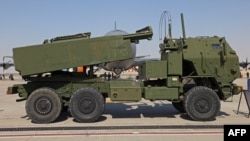 FILE - A U.S. M142 HIMARS rocket launcher is parked on the tarmac at the 2021 Dubai Airshow in the Gulf emirate, Nov. 15, 2021. 